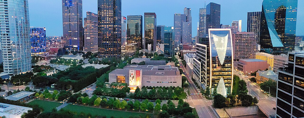 Real dusk view of Klyde Warren Park, the Dallas Arts District and downtown Dallas towers